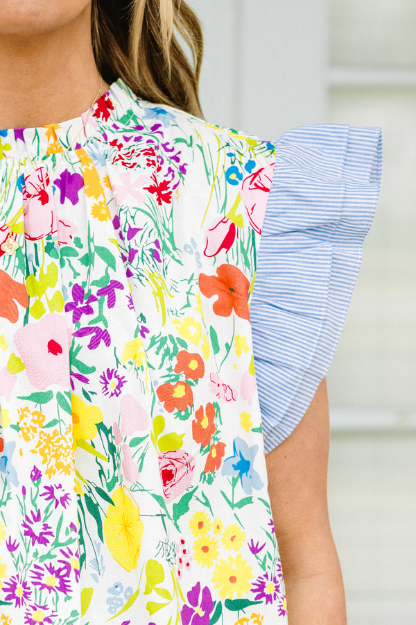 Chic Soul plus size clothing, short-flutter-sleeve multi-colored floral top with a ruffled mock neck and a multi-colored floral pattern with navy blue color-block sleeves 