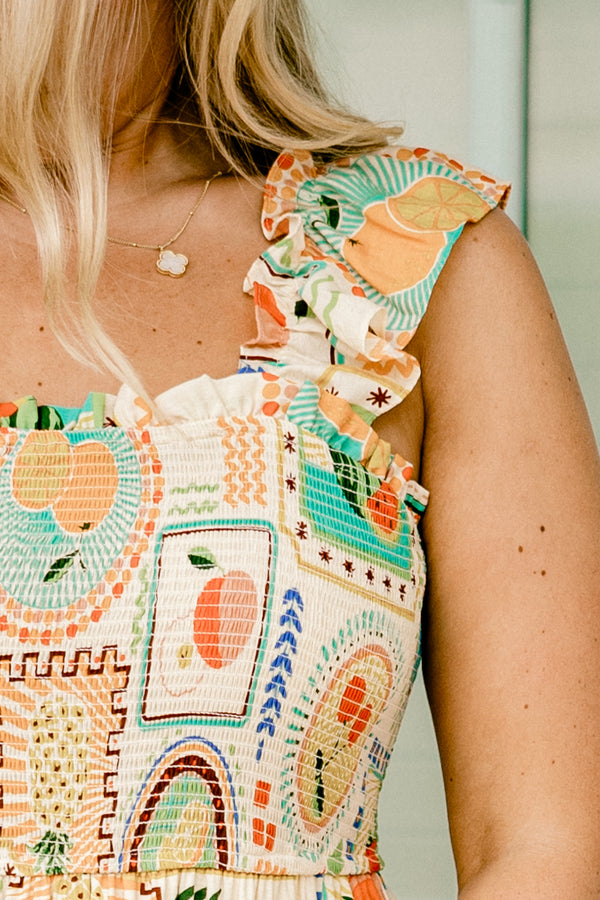 Chic Soul plus size clothing, orange  maxi dress with ruffle details on the straps and various fruit graphics throughout 