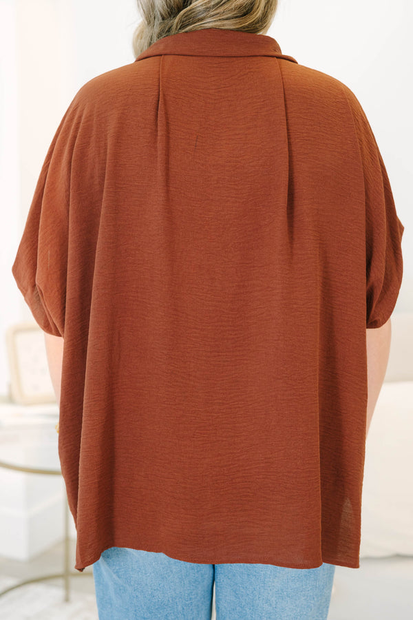 Plus size flowy brown button-down  Top with a collared neckline and drop shoulders.