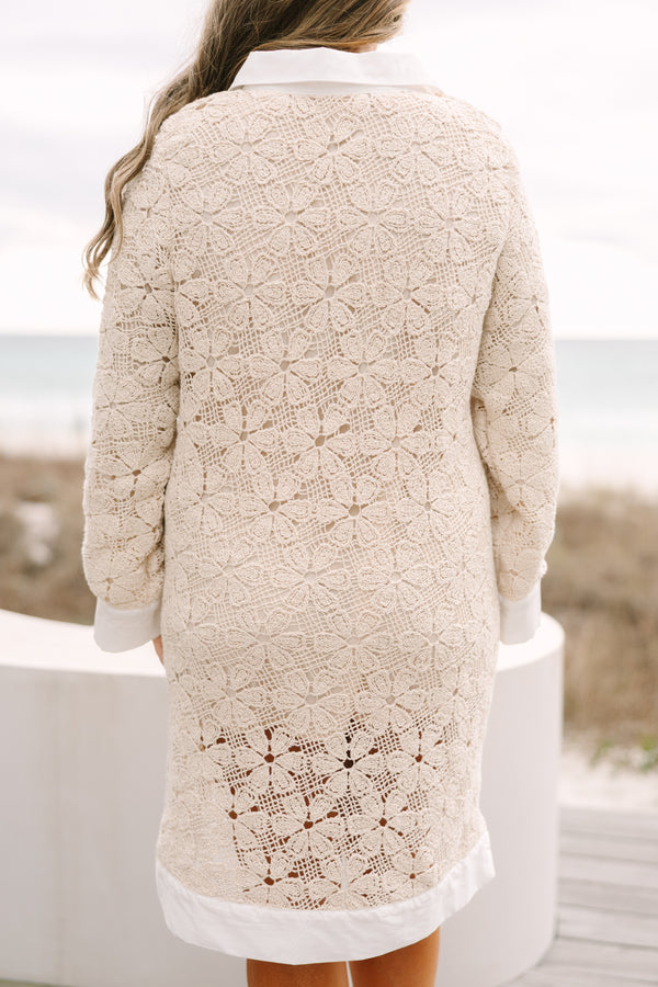 Chic Soul plus size clothing, cream floral lace knee length dress that has long sleeves as well as white cuffs at the end of the sleeves bottom of the dress and along the v-neckline 
