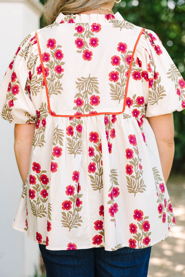 Plus Size cream babydoll top with red floral print, puff sleeves, and orange piping detail.
