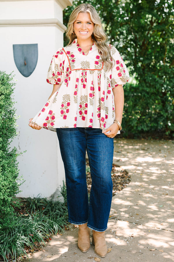 Plus Size cream babydoll top with red floral print, puff sleeves, and orange piping detail.