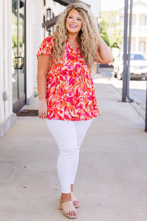 Chic Soul plus size clothing, short-sleeve pink baby doll top with v-neckline and orange and pink floral pattern