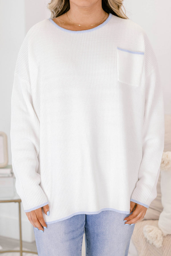 Chic Soul plus size clothing, ivory sweater with long sleeves and a front pocket of the left side of the chest as well as blue stitching details on the end of the sleeves around the neckline bottom of the sweater and outlining the top of the chest pocket 