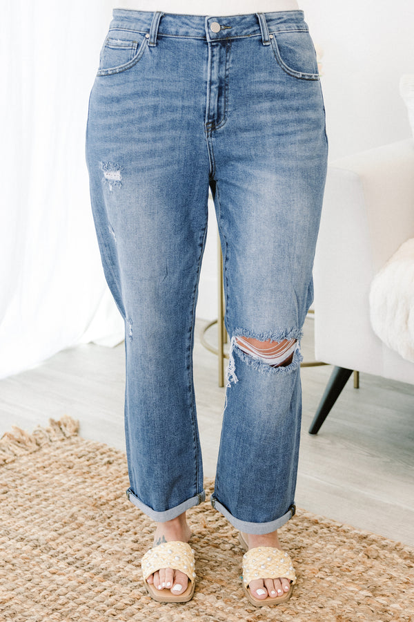 Chic Soul plus size clothing, light/medium wash denim jeans wide leg with hole on one knee with light distressing with cuff bottom