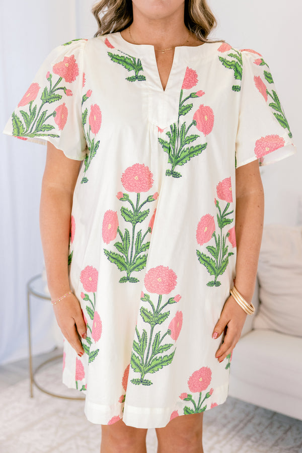 Chic Soul plus size clothing, cream knee length dress with short sleeves a slight v-neckline and a pink and green floral block pattern throughout 