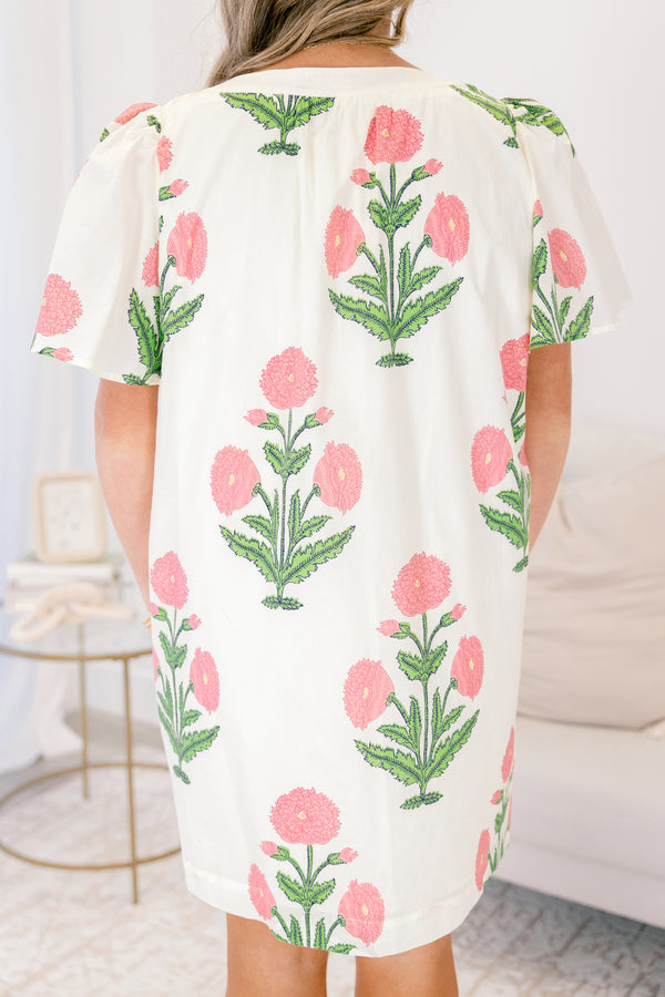 Chic Soul plus size clothing, cream knee length dress with short sleeves a slight v-neckline and a pink and green floral block pattern throughout 
