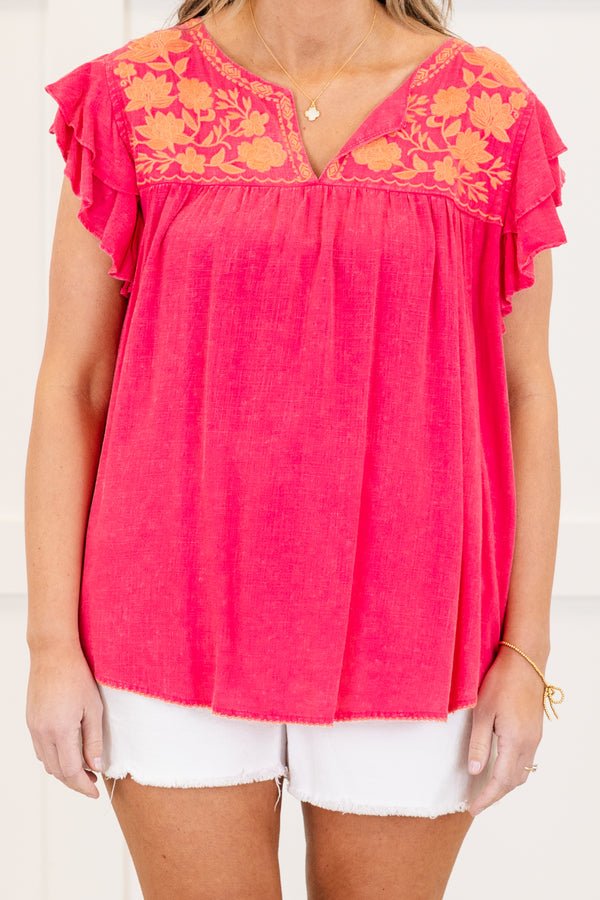 Chic Soul plus size clothing, short-flutter-sleeve hot pink top with a split-v-neckline and an orange embroidered floral design on the neckline 