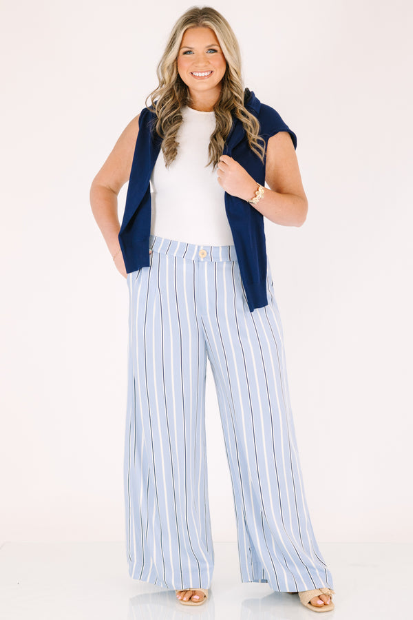 Chic sou plus size clothing, blue striped straight leg pants with pockets and a button in the middle of the waistband 