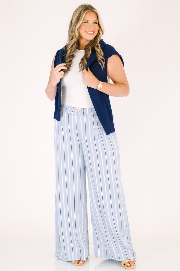Chic sou plus size clothing, blue striped straight leg pants with pockets and a button in the middle of the waistband 
