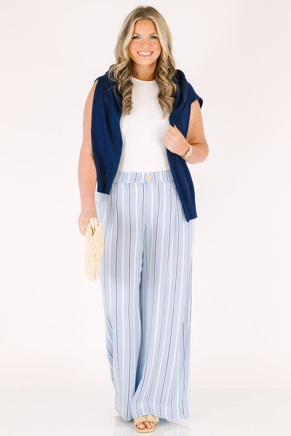 Chic sou plus size clothing, blue striped straight leg pants with pockets and a button in the middle of the waistband 