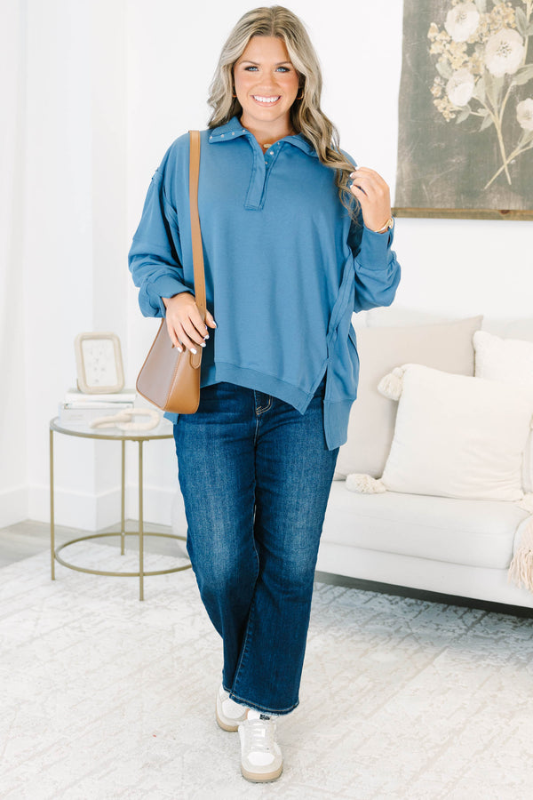 Plus Size blue long-sleeve pullover with a collared snap-button neckline and ribbed trim.