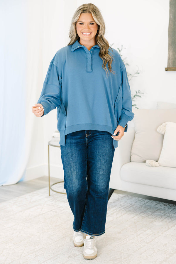 Plus Size blue long-sleeve pullover with a collared snap-button neckline and ribbed trim.