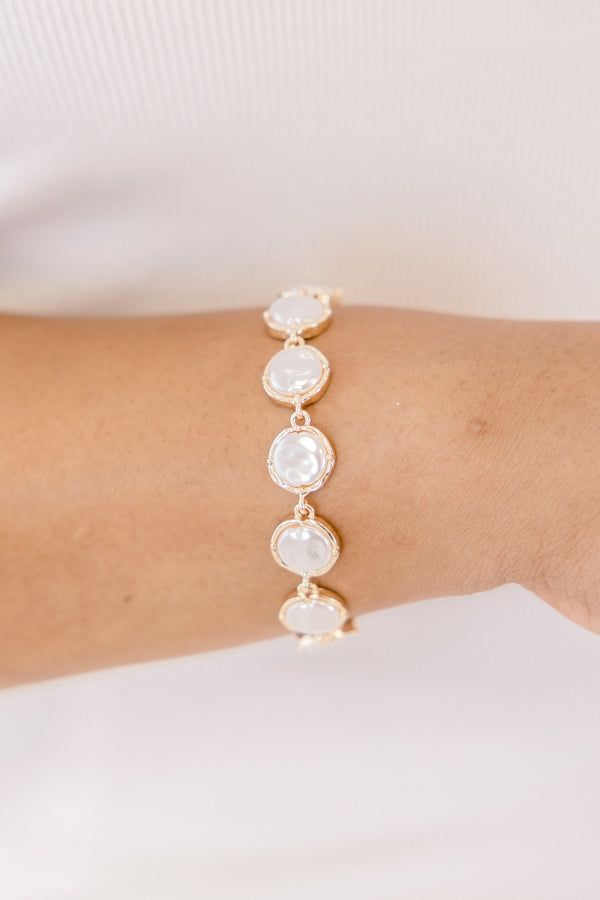 Chic Soul plus size clothing, gold bracelet with round pearls attaching to one another going around the bracelet 