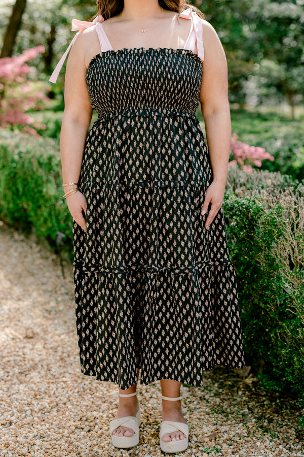 Chic Soul plus size clothing, sleeveless solid white tied bow straps with a black ruffled tiered midi dress with a smocked bodice and a subtle abstract pattern