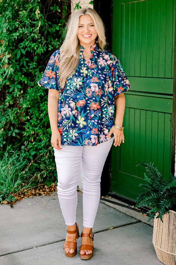 Chic Soul plus size clothing, navy blue short-bubble sleeve high collar slit neckline top with bright yellow and orange floral pattern