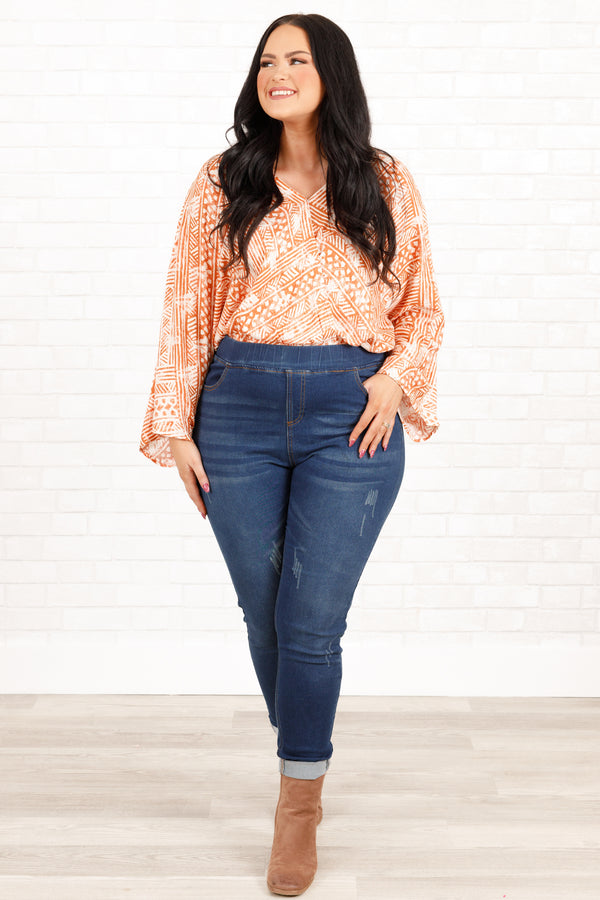 Chic Soul plus size clothing, rust and cream bohemian patterned bodysuit with crisscross neckline and bell sleeves
