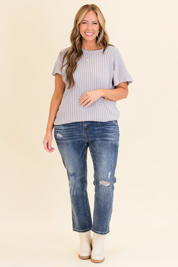 Chic Soul plus size clothing, medium wash straight leg jeans with light holes/distressing on knees with stitched hem