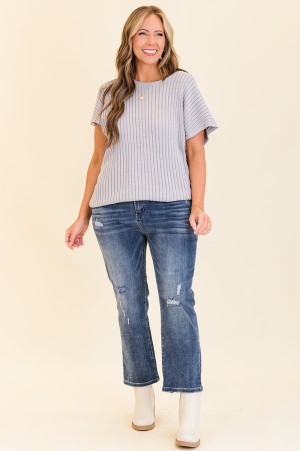 Chic Soul plus size clothing, medium wash straight leg jeans with light holes/distressing on knees with stitched hem