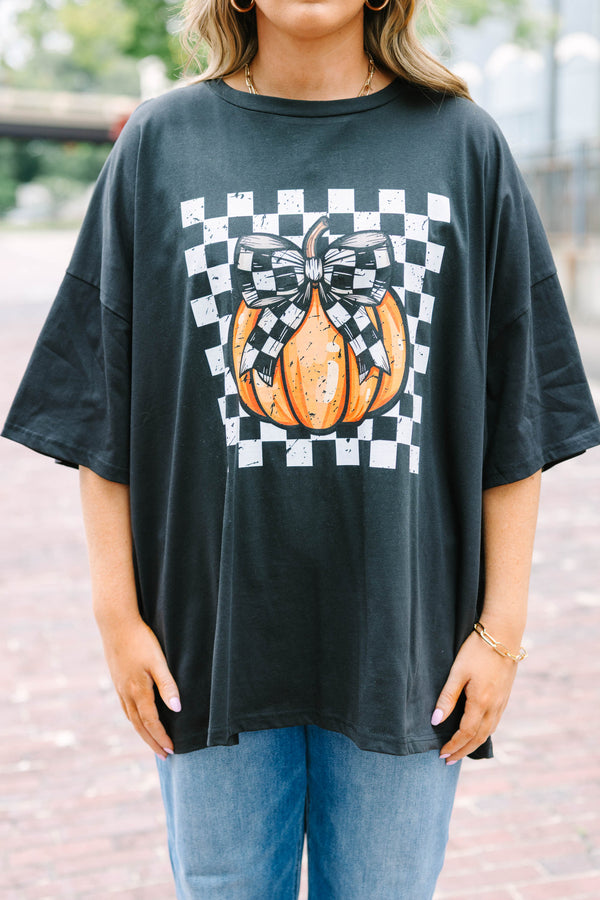 black oversized boyfriend tee with a checkered pumpkin graphic