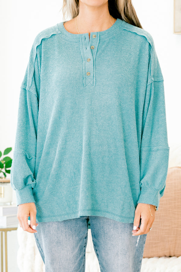 Chic Soul Plus size clothing, teal sweater with long bubble sleeves buttons going down the neckline and stitching details on the sleeves and bottom of the sweater 
