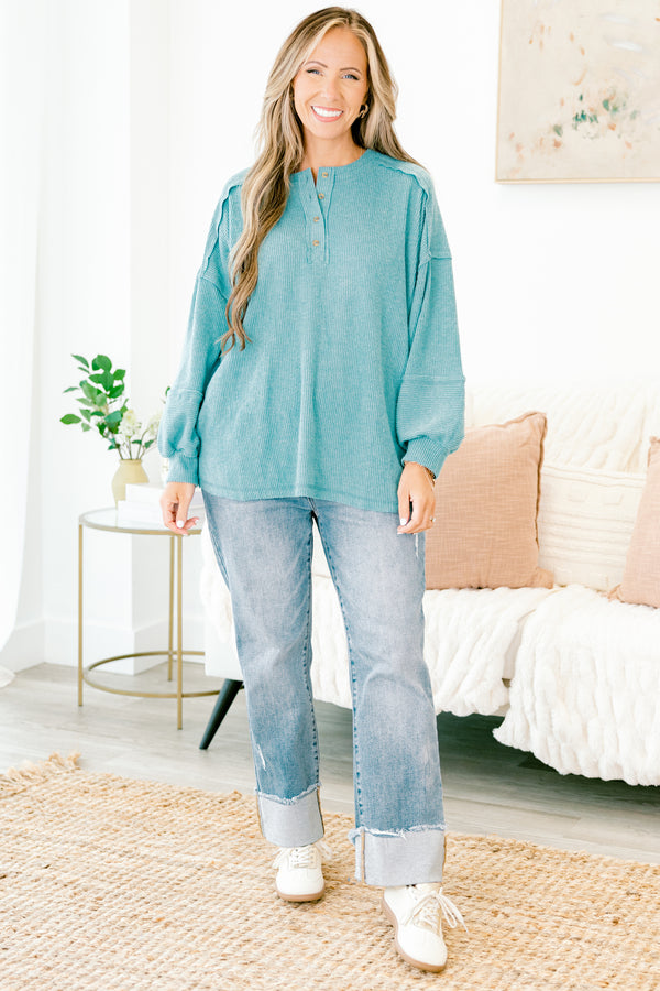 Chic Soul Plus size clothing, teal sweater with long bubble sleeves buttons going down the neckline and stitching details on the sleeves and bottom of the sweater 
