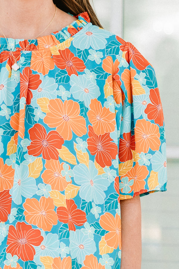 Chic Soul plus size clothing, blue short sleeve top with round neckline and puff sleeve detail with large orange/blue floral print