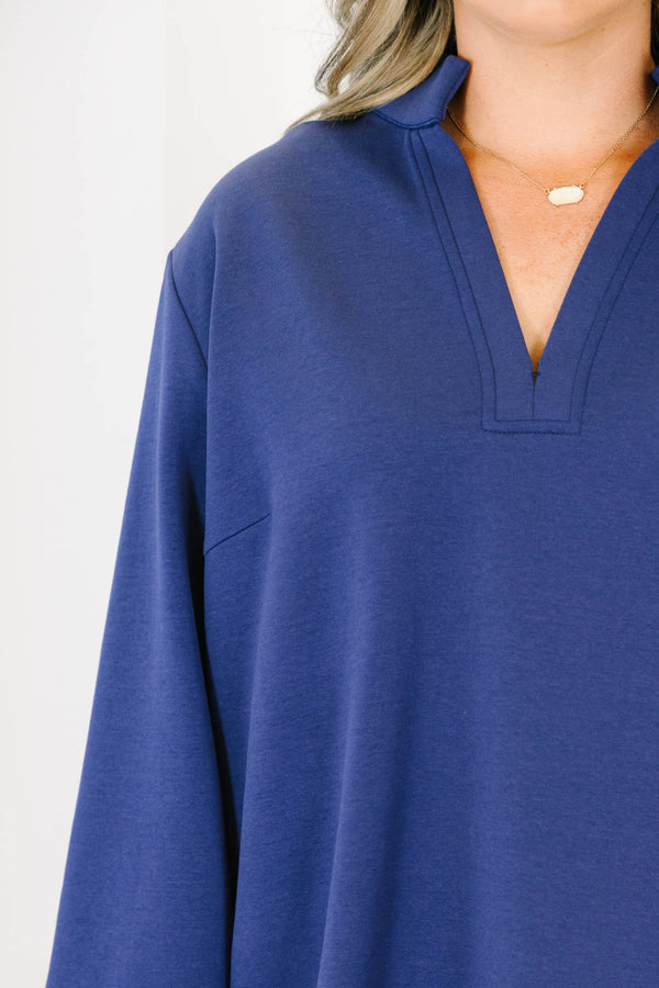 Plus size navy Classic Charm Top with long sleeves, a flowy fit, v-neckline, and stretchy cotton-blend fabric.