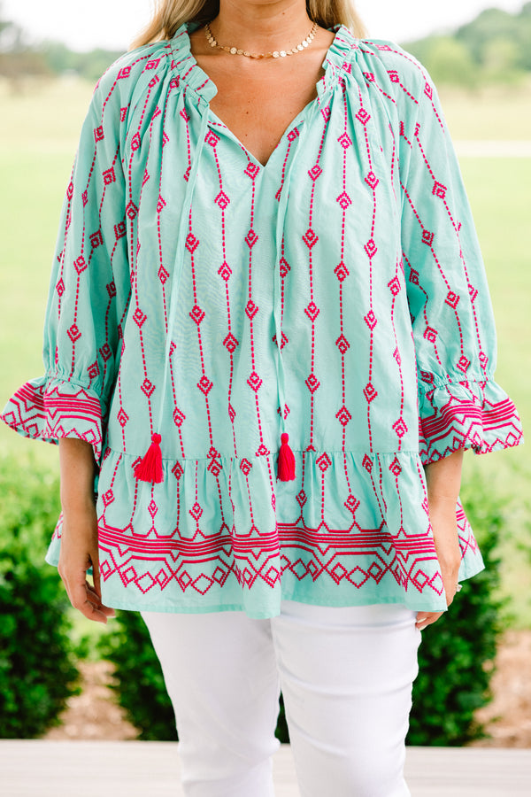 Chic Soul plus size clothing.  aqua half sleeve top with pink embroidery details throughout and a slight v-neck 