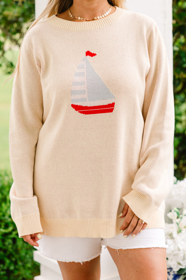 Chic Soul plus size clothing, ivory long sleeve sweater with a red and blue stitched sail boat on the center of the sweater 