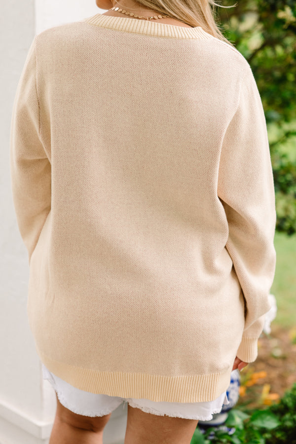 Chic Soul plus size clothing, ivory long sleeve sweater with a red and blue stitched sail boat on the center of the sweater 