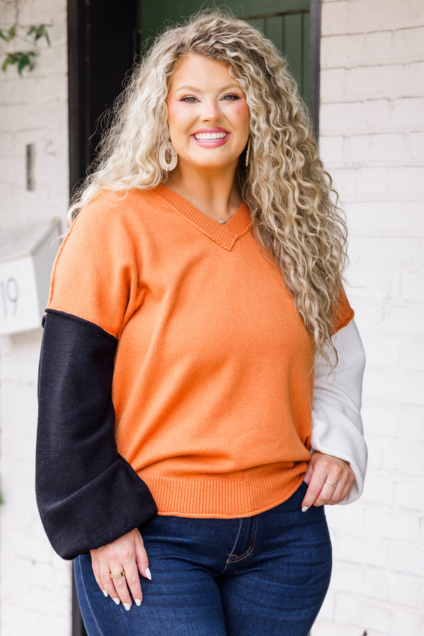 Chic Soul plus size clothing, long-sleeve copper sweater with v-neckline with one ivory sleeve and one black sleeve with distressed detailing