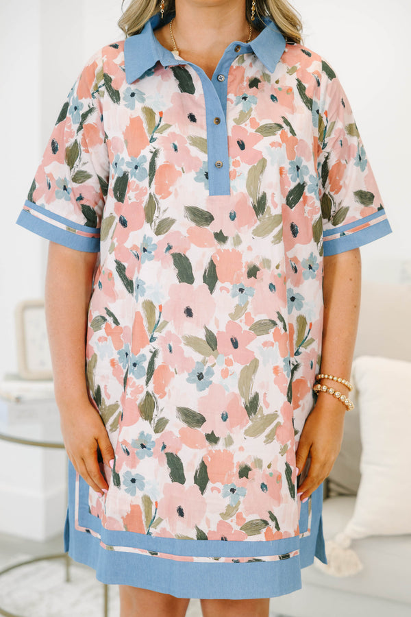 Plus size pink floral cotton dress with blue denim-style collar, button placket, and hem trim.