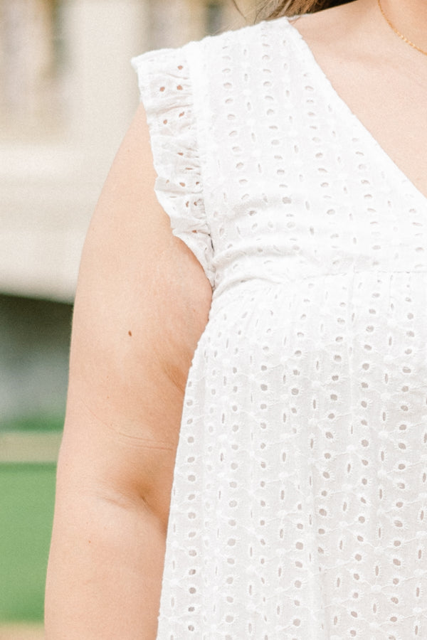 Plus Size white eyelet mini dress with flutter sleeves, a V-neckline, and a scalloped lace hem.