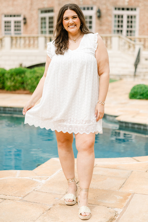 Plus Size white eyelet mini dress with flutter sleeves, a V-neckline, and a scalloped lace hem.