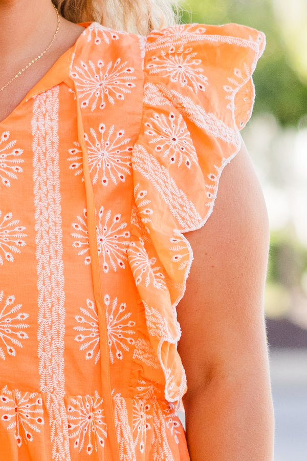 Plus Size orange eyelet dress with flutter sleeves, vertical patterns, and a scalloped hemline.