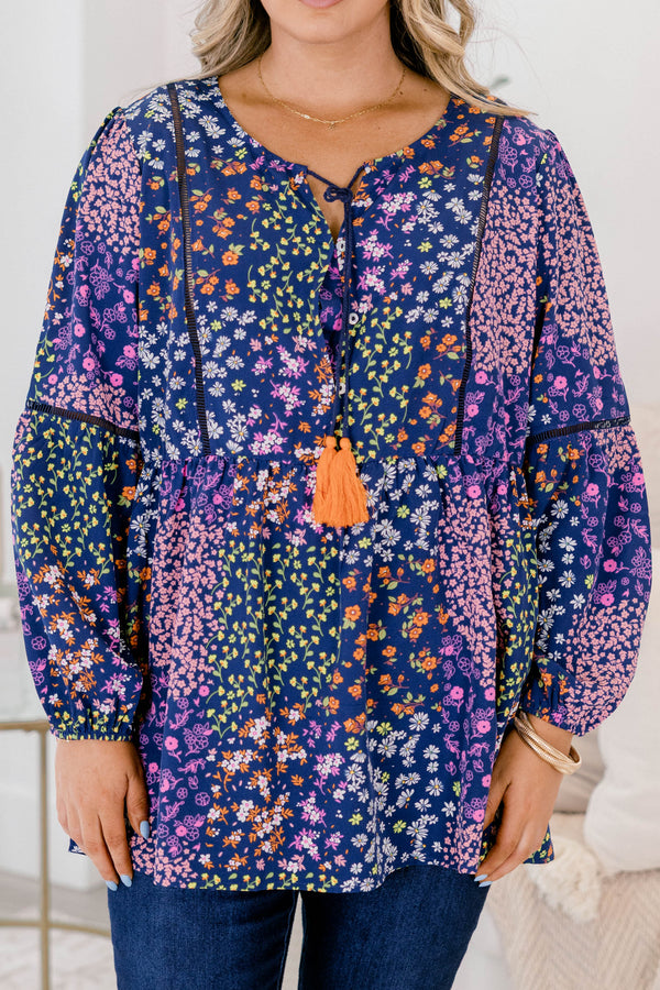 Chic Soul plus size clothing, navy floral long sleeve top with orange tassels hanging from the neckline 