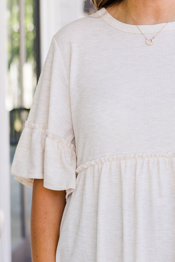 Chic Soul plus size clothing, short sleeve oatmeal babydoll top with round neckline and ruffle detail on sleeves with ruffle detail on bottom of top