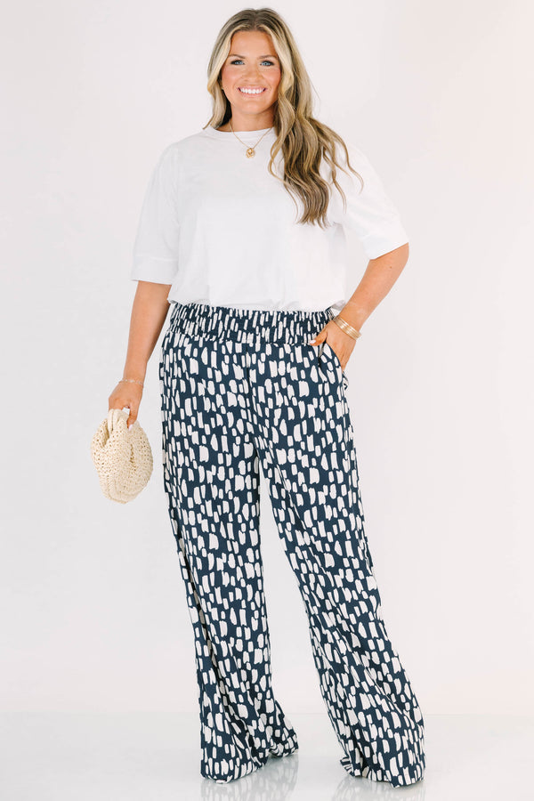 Chic Soul plus size clothing, flowy pants with smocked waist and navy and white pattern
