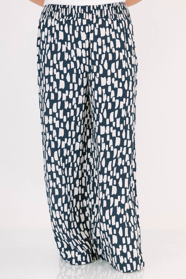 Chic Soul plus size clothing, flowy pants with smocked waist and navy and white pattern