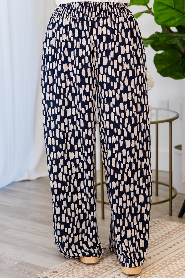 Chic Soul plus size clothing, flowy pants with smocked waist and navy and white pattern