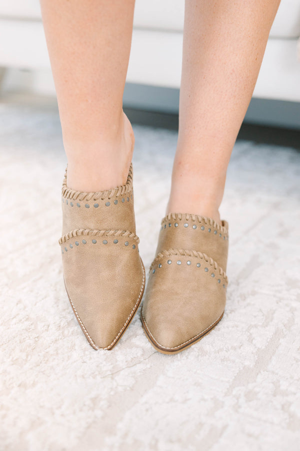 Corky's Blame It Mules in tan suede with a pointed toe, block heel, and studded whipstitch detail.