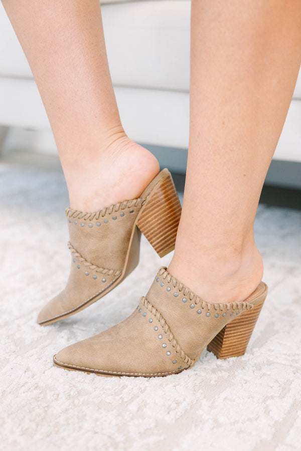 Corky's Blame It Mules in tan suede with a pointed toe, block heel, and studded whipstitch detail.