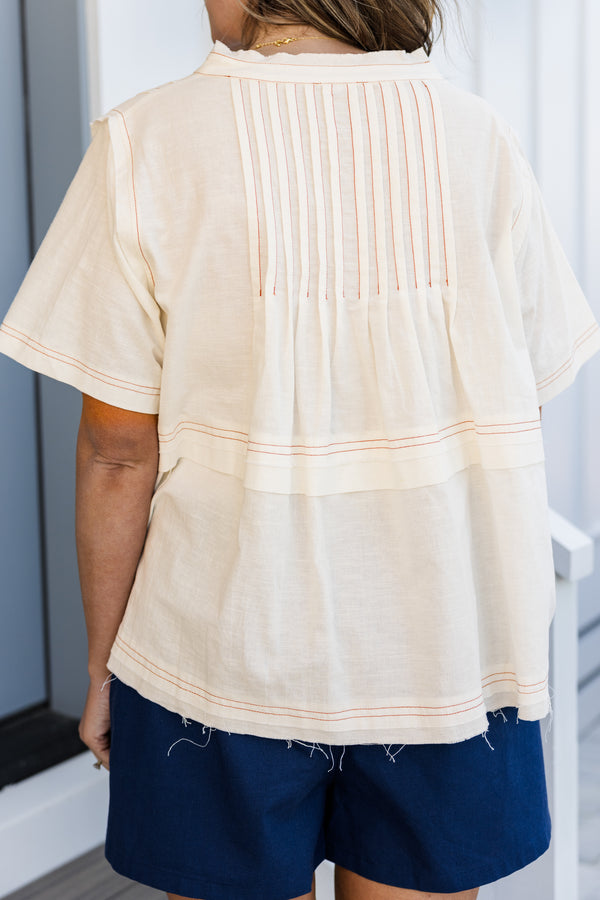Chic Soul plus size clothing, short-sleeve white top with a pintuck stitching and an unfinished distressed hem 
