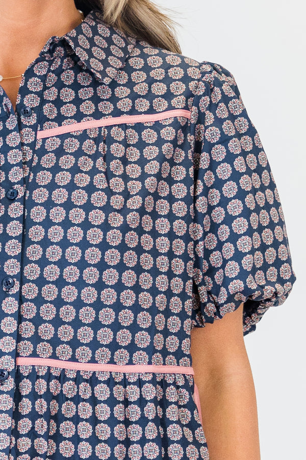 Plus Size navy button-down top with a floral pattern, puff sleeves, and pink piping details.