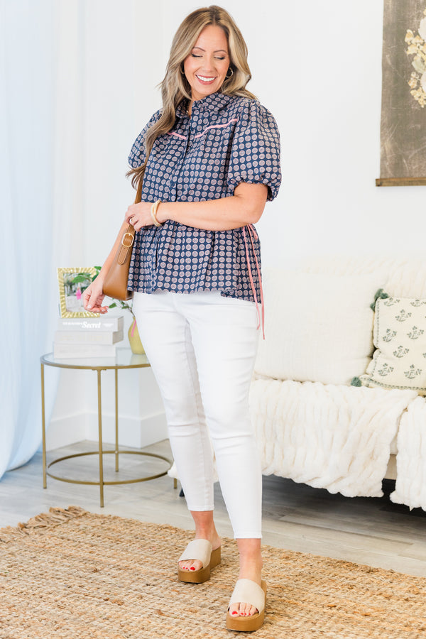 Plus Size navy button-down top with a floral pattern, puff sleeves, and pink piping details.