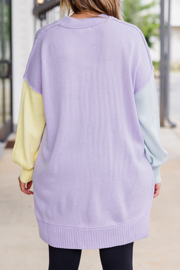 Chic Soul plus size clothing, long-sleeve lavender multi-colored sweater with one sleeve pale blue and one sleeve pale yellow with distressed stitching