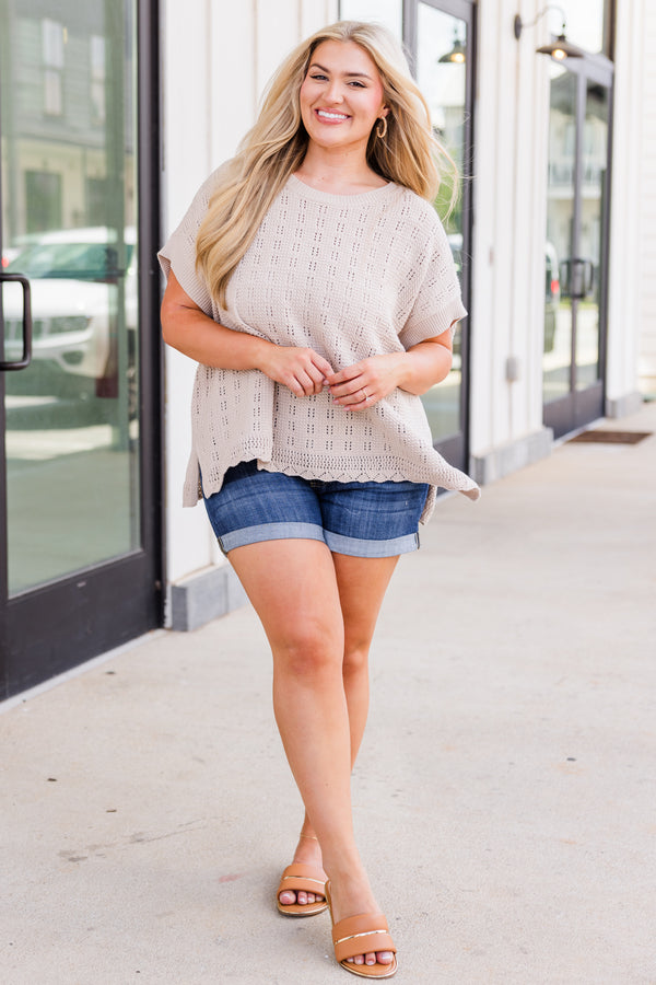 Plus Size latte-colored textured knit top with a relaxed fit, side split, and scalloped hem.