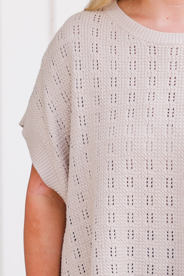 Plus Size latte-colored textured knit top with a relaxed fit, side split, and scalloped hem.