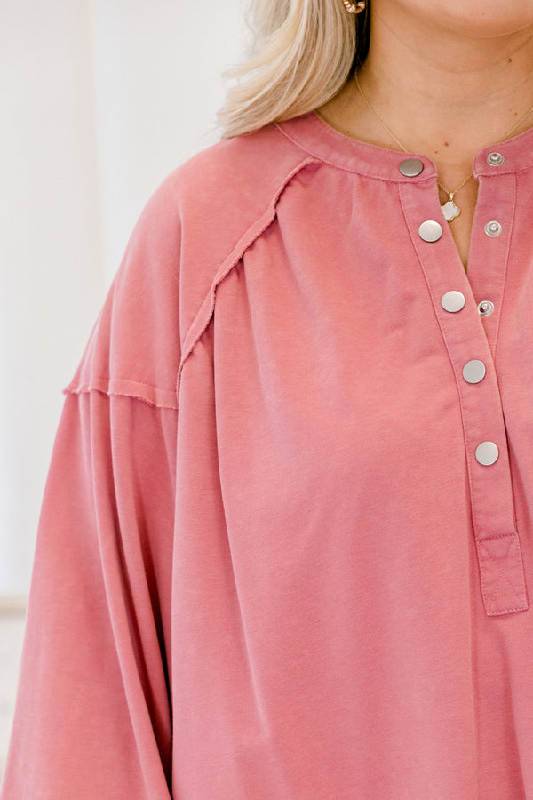 Chic Soul plus size clothing, mauve pink long sleeve top with buttons going down to the chest as well as distressed details at the bottom of the top